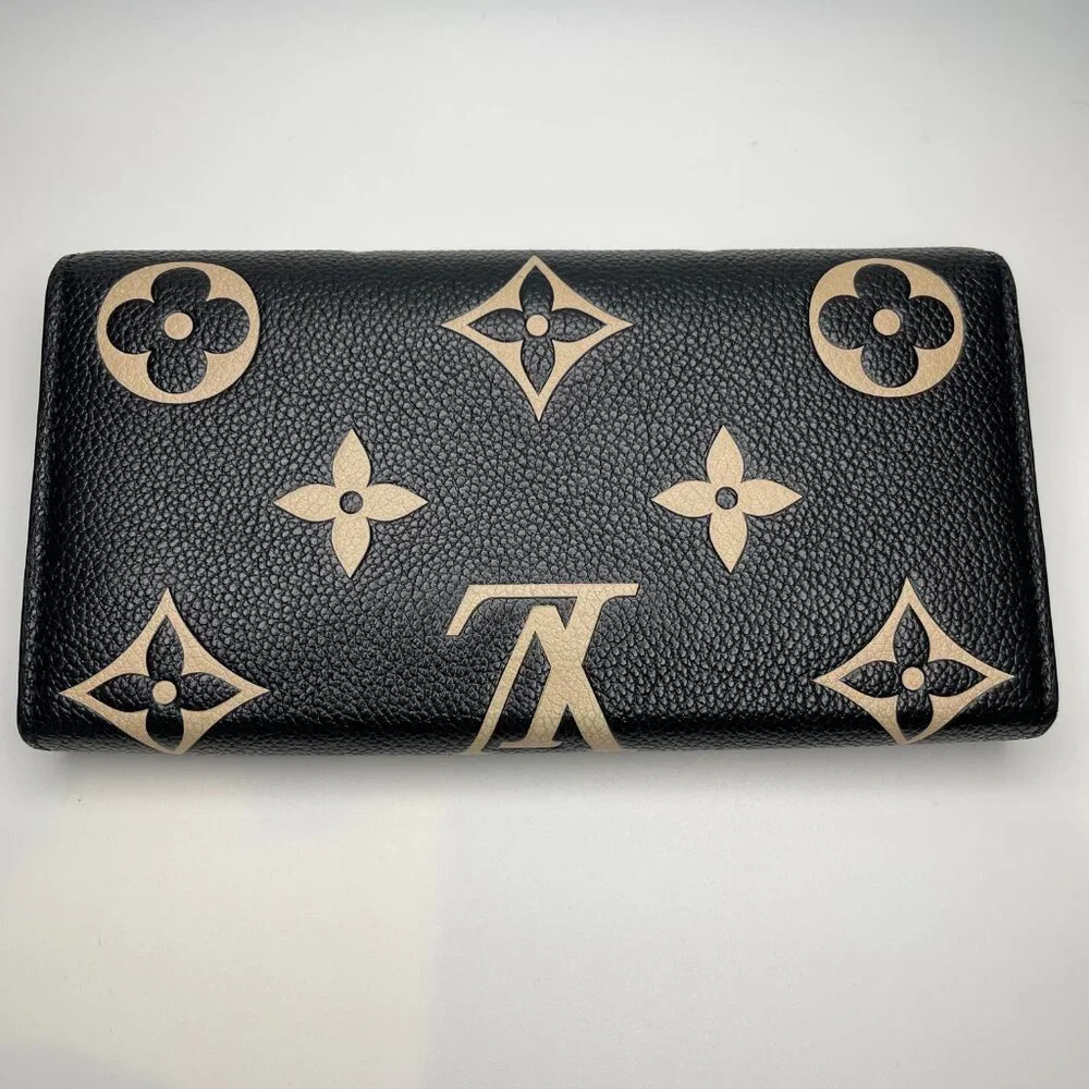 LOUIS VUITTON RFID Bicolor Monogram Empreinte Leather Sarah Wallet - Preowned - Picture 2 of 16